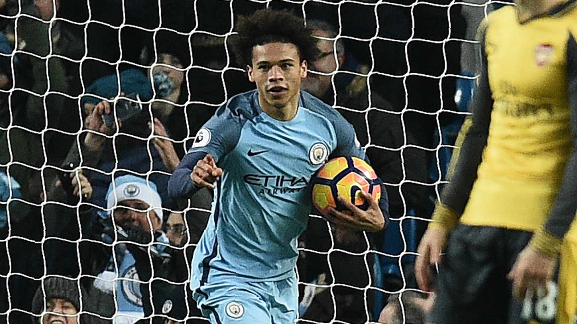 Leroy Sane celebrates scoring his first goal for Manchester City. Goal