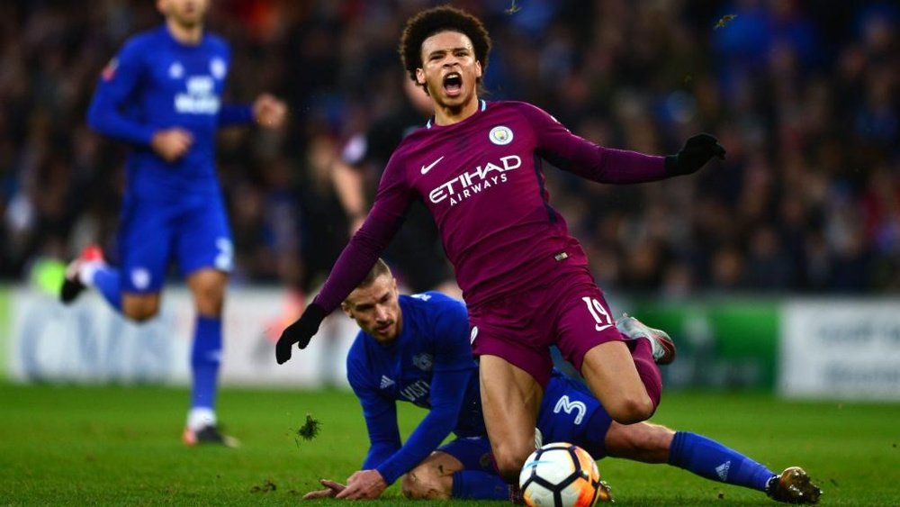 Bennett sorry for horror tackle on Sane