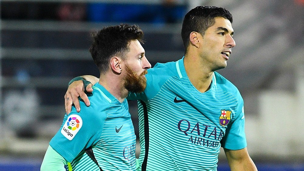 Lionel Messi et Luis Suarez dans le match de Liga entre Eibar et Barcelone. AFP