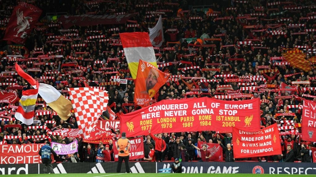 Liverpool fans injure two police officers