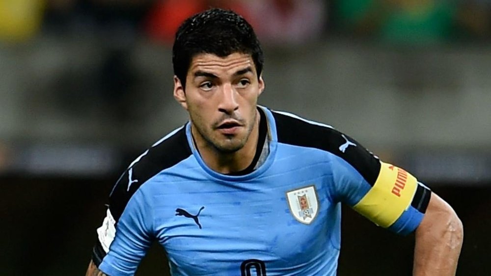 Suarez puts World Cup controversies behind him
