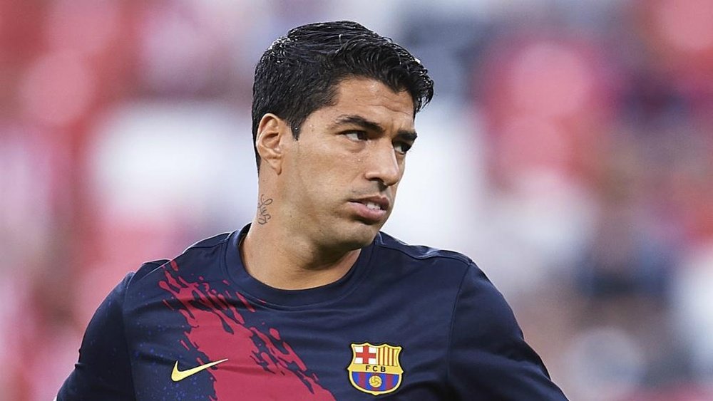 Suarez worried by Barcelona defeat at Granada.