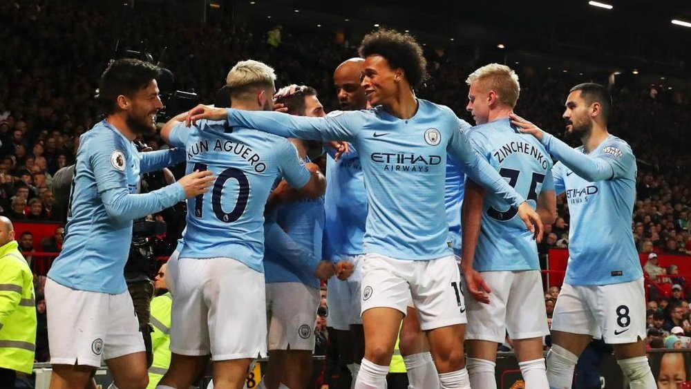Guardiola and Man City break records in derby win at Old Trafford.