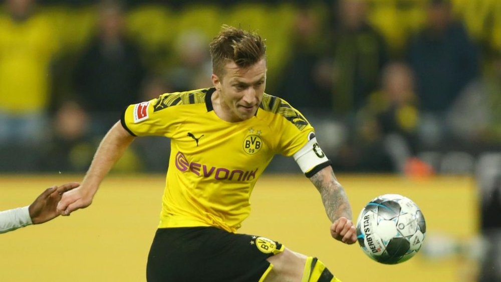 Marco Reus has still not returned to training since picking up a muscle injury. GOAL