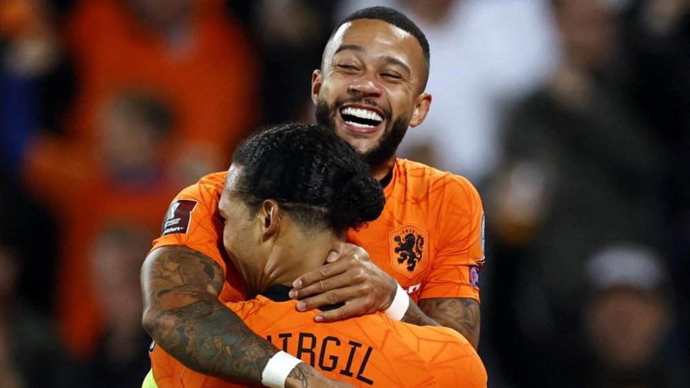 Memphis Depay and Virgil van Dijk celebrate a goal against Gibraltar. GOAL