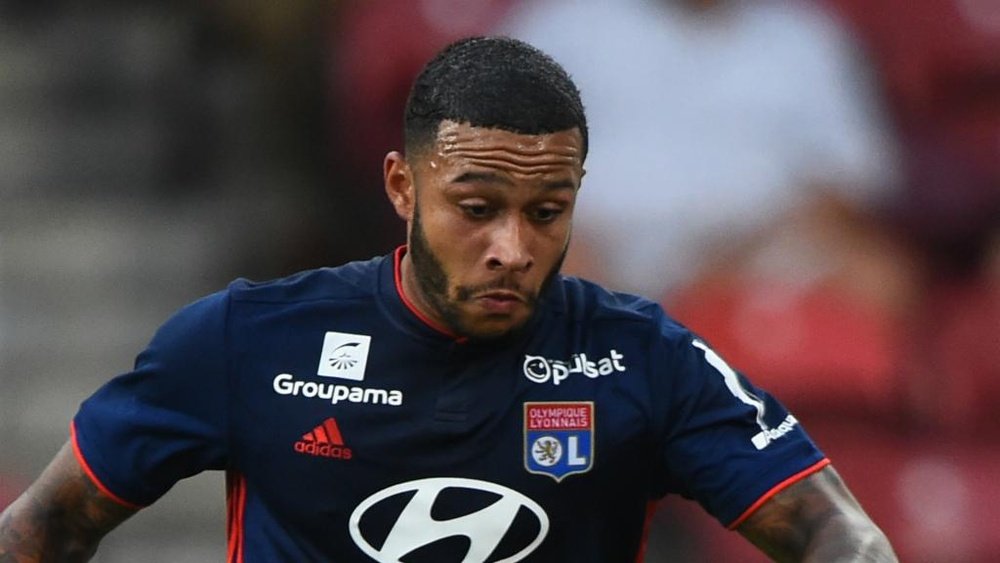 Depay has his eyes on a summer move. GOAL