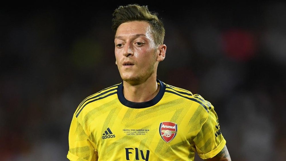 Mertesacker croit en un retour en grâce de Mesut Ozil avec Arsenal. AFP