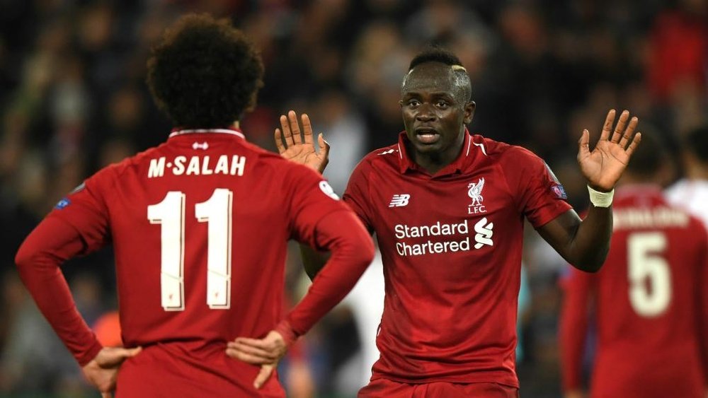 Salah is back in the side for Liverpool's game with Bournemouth while Mane drops to the bench. GOAL
