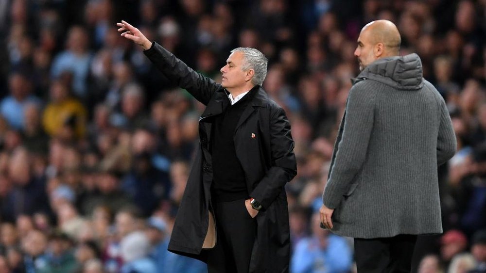 Mourinho and Guardiola pictured at the Manchester Derby. GOAL