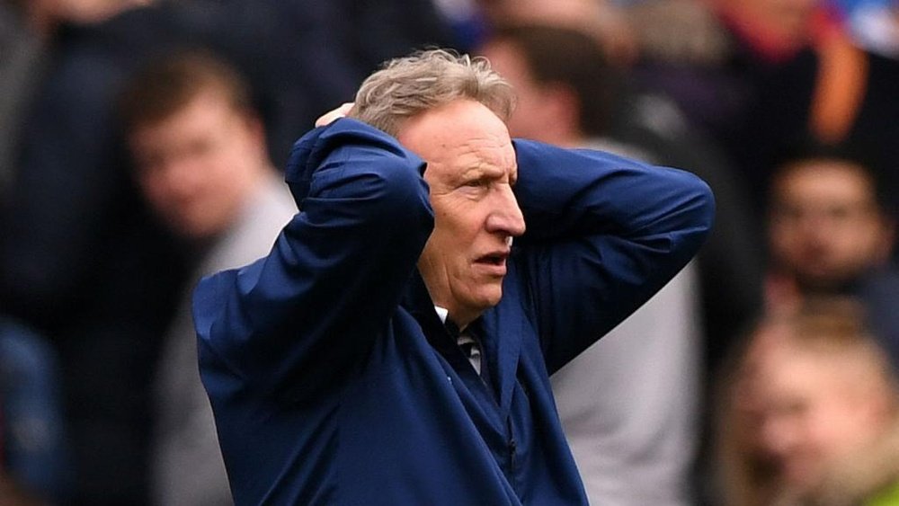Warnock charged by FA for remarks after Chelsea loss. AFP