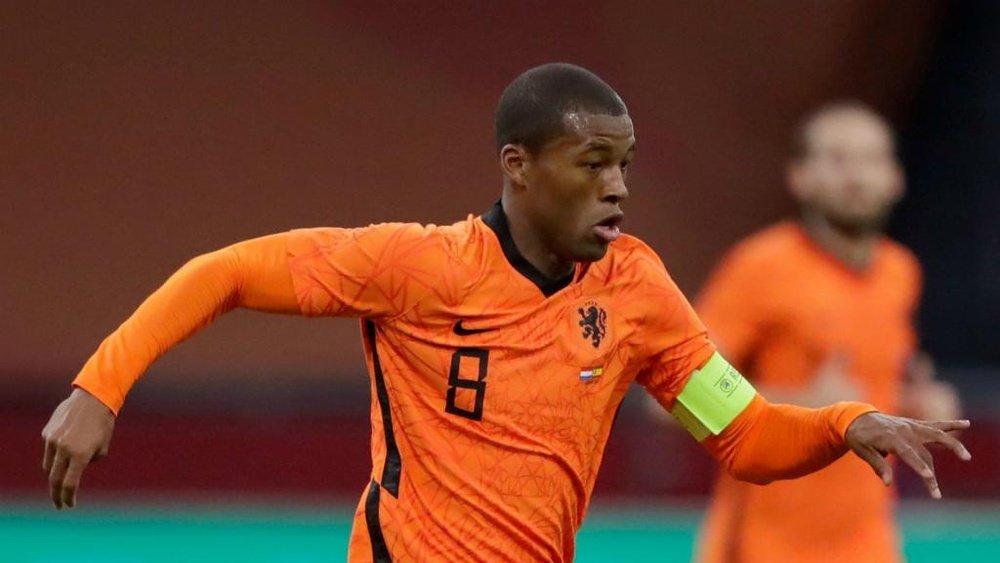 Wijnaldum has mixed emotions after captaining Netherlands in Van Dijk's absence. AFP