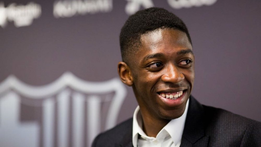 Dembele has put pen to paper on a five-year contract at Barcelona. GOAL
