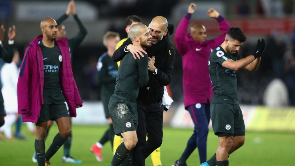 City won a record-breaking fifteenth consecutive Premier League game against Swansea. AFP