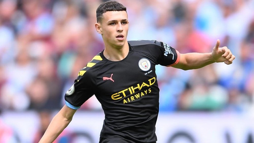 ep Guardiola wants to see more from midfielder Phil Foden
