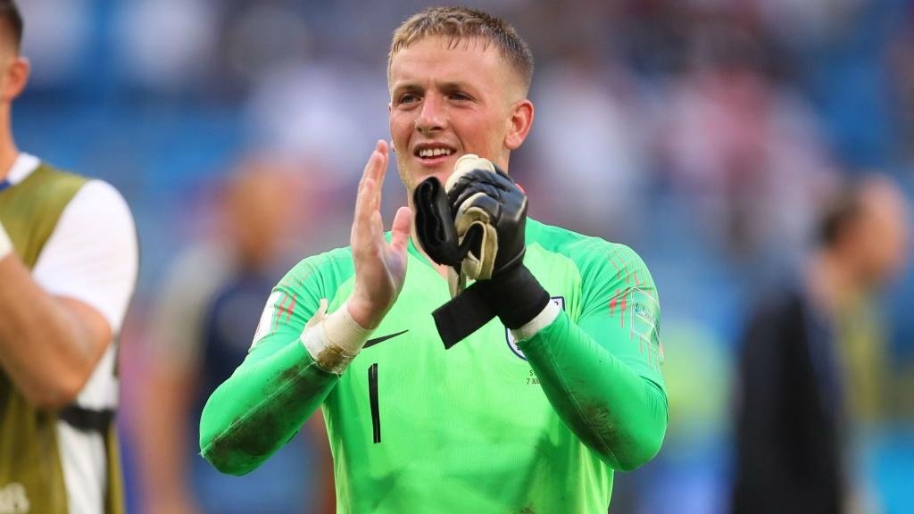 Pickford insists he is not far off Courtois' level. GOAL