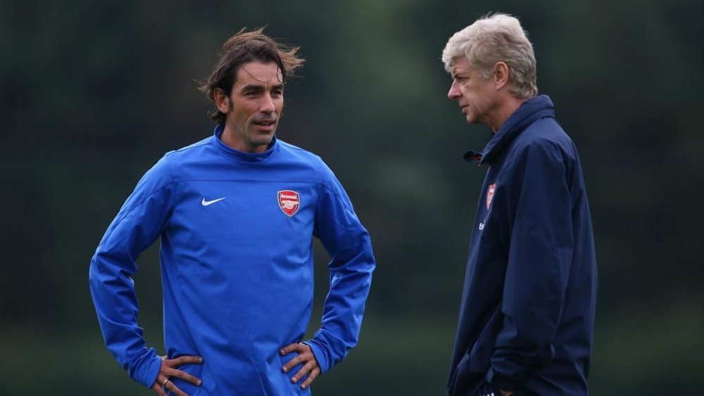 Pires and Wenger pictured at Arsenal. GOAL