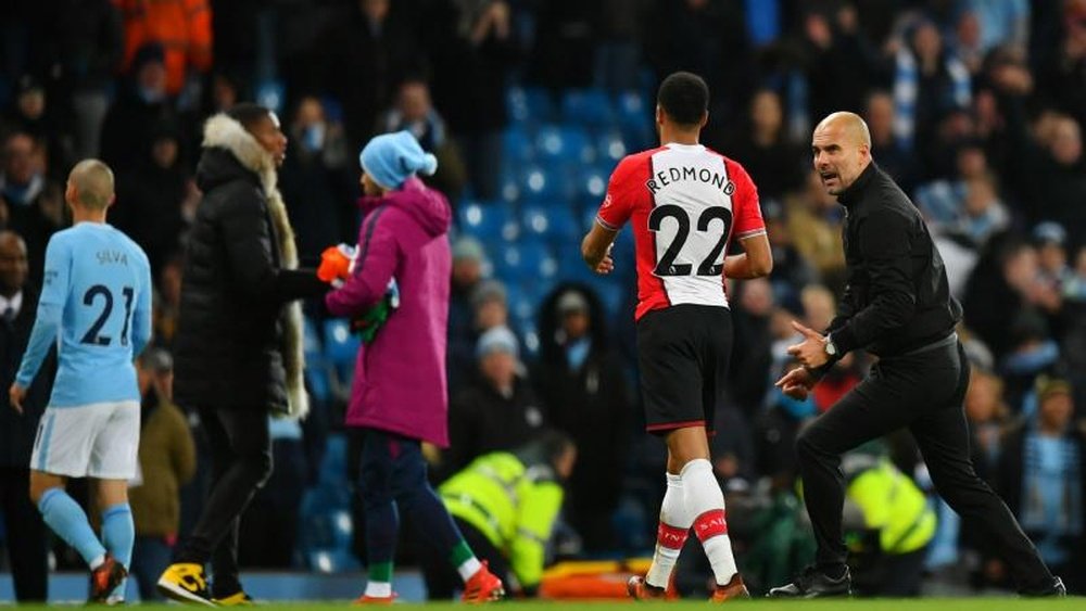 Redmond explains Guardiola clash. GOAL