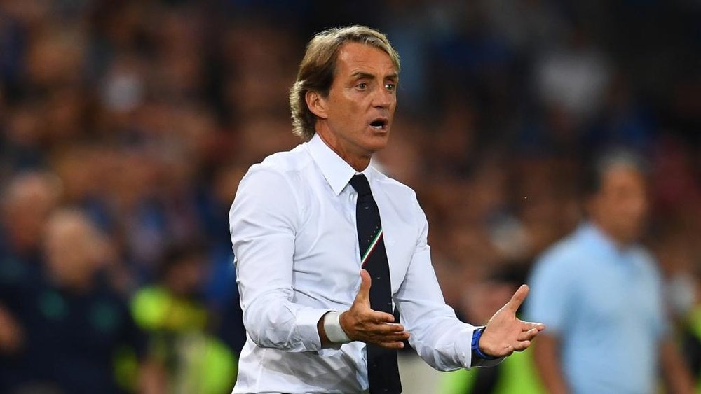 Mancini planning changes after 'tired' Italy held again. AFP