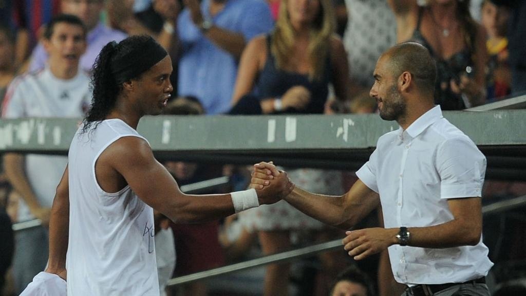Guardiola says Ronaldinho helped Barcelona to rediscover their self-esteem. GOAL