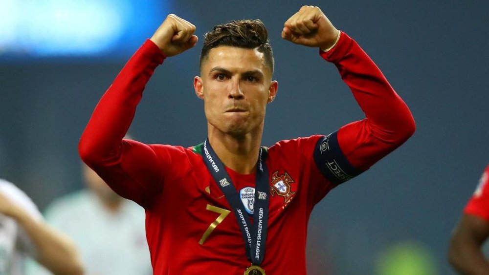 Cristiano Ronaldo with his Nations League medal. GOAL