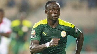 Mane becomes Senegal's record goalscorer with hat-trick against Benin. AFP