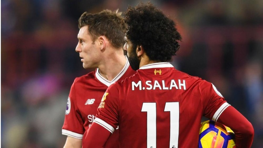 Milner and Salah are team-mates. GOAL