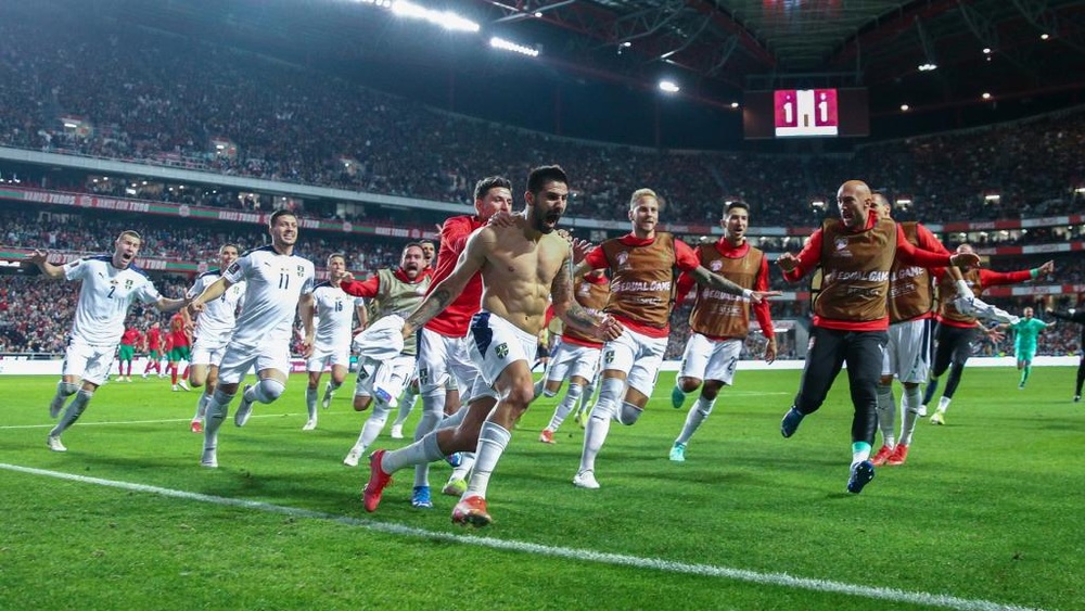 Serbia 'have no limit' as Stojkovic, Tadic and Mitrovic celebrate World Cup qualification.