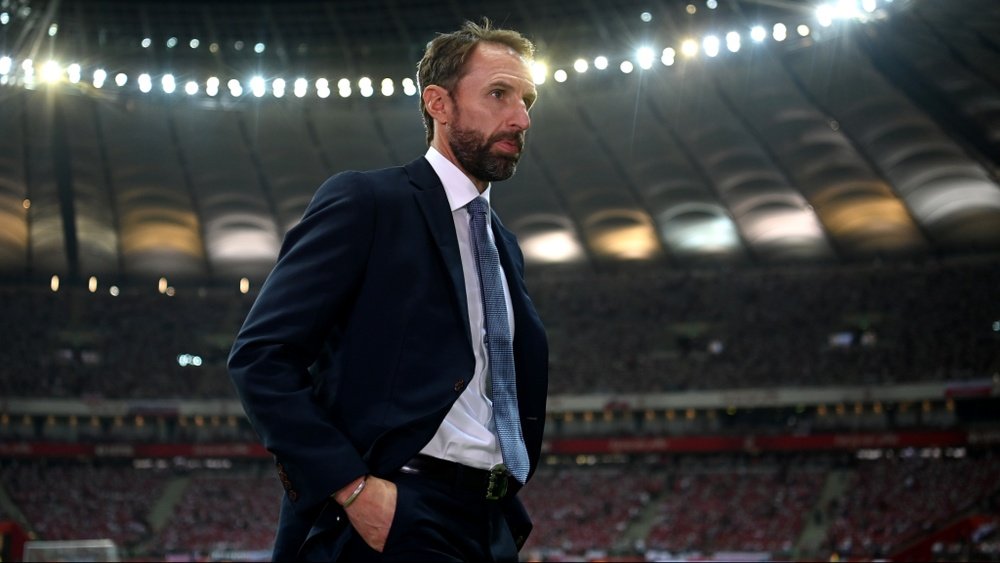 England boss Southgate defends lack of subs in World Cup qualifying draw against Poland. AFP