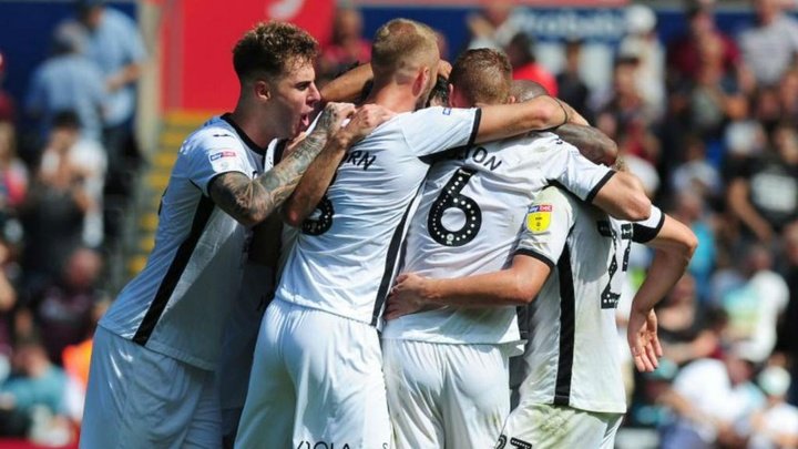 Swansea's late goals see off Birmingham