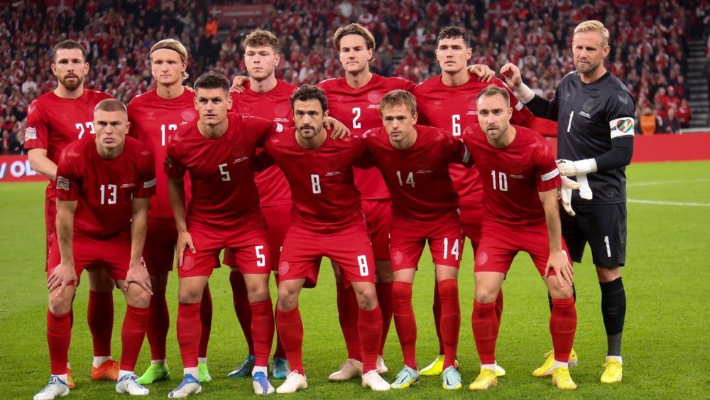 World Cup workers with Denmark kit protest. AFP