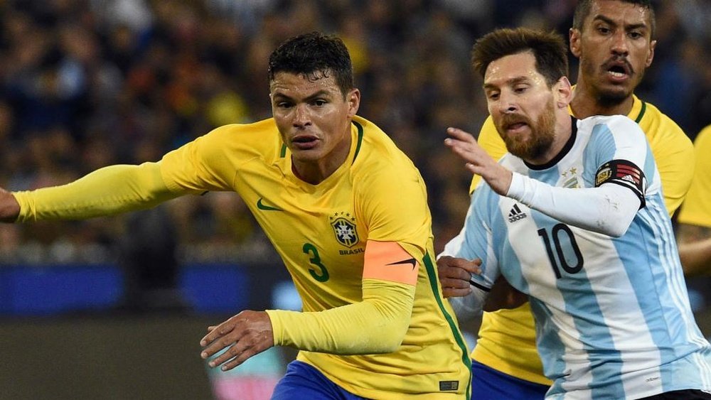 Silva contre Messi. AFP