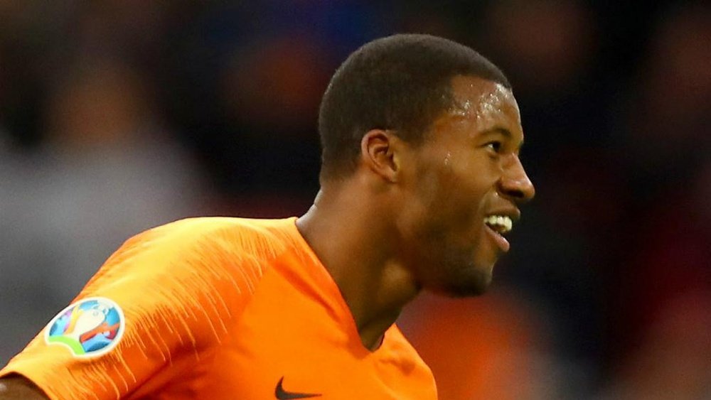 Hat-trick hero Wijnaldum 'so happy', says Netherlands boss Koeman. AFP