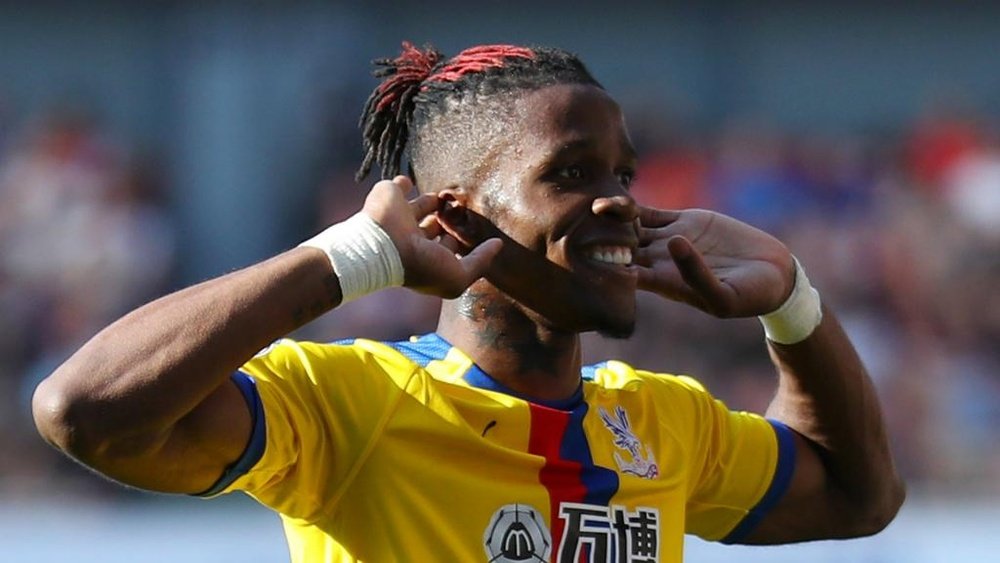 Wilfried Zaha has been linked with a move to Arsenal. GOAL