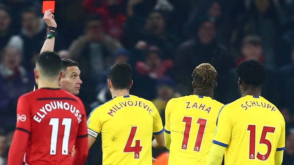 Zaha apologises for red card